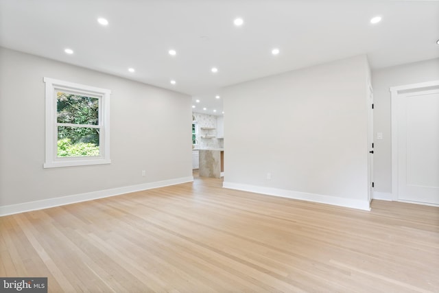 3 Knox Pl, Silver Spring, MD 20901 - unfurnished living room with light wood finished floors and recessed lighting