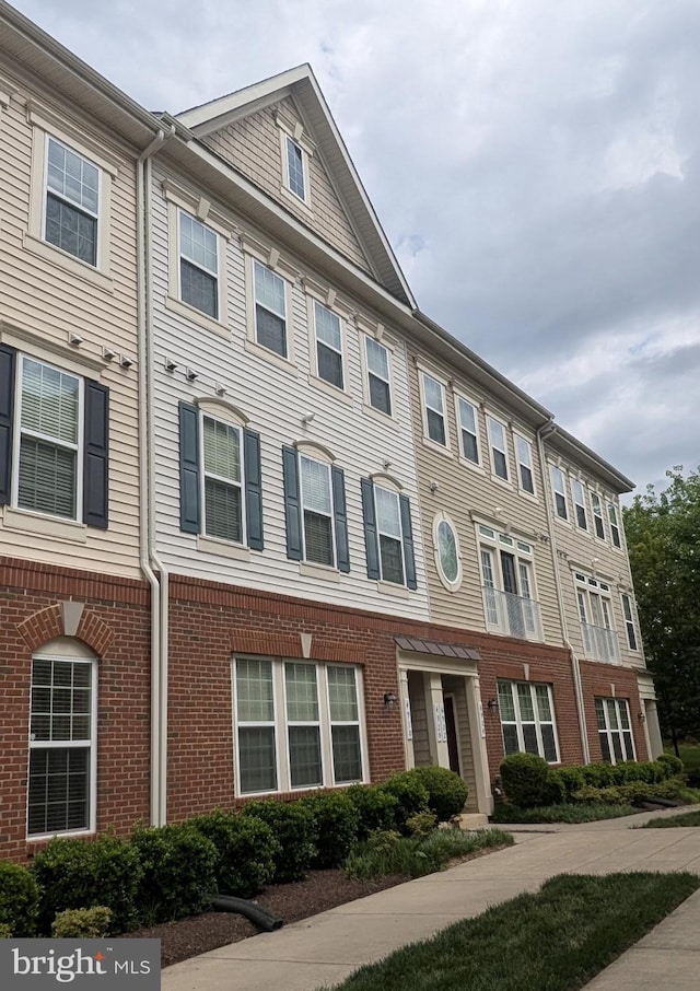 multi unit property with brick siding