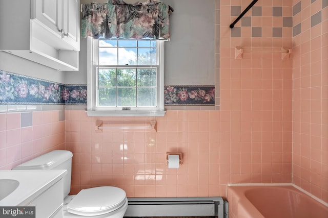 bathroom with a baseboard radiator, toilet, tile walls, a wainscoted wall, and  shower combination