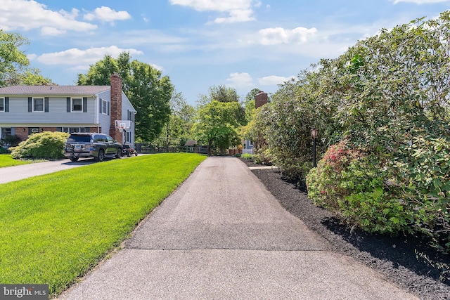 surrounding community featuring a lawn