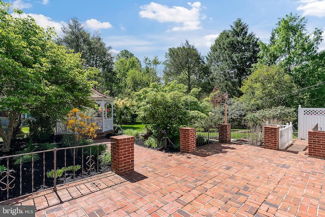 view of patio with fence