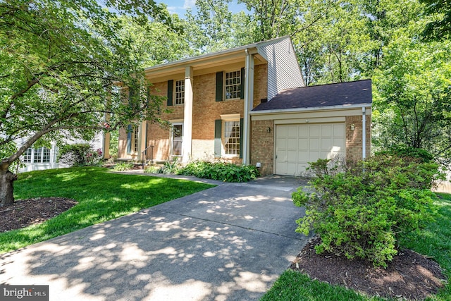 705 Upham Pl NW, Vienna, VA 22180 - greek revival inspired property with brick siding, concrete driveway, an attached garage, and a front lawn