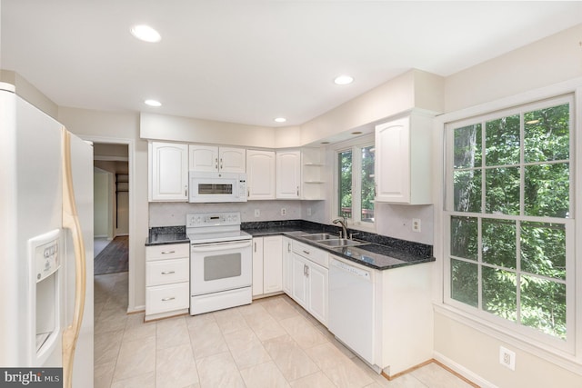 705 Upham Pl NW, Vienna, VA 22180 - kitchen with white appliances, a sink, tasteful backsplash, white cabinetry, and recessed lighting