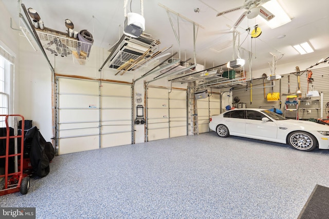 18729 Upper Meadow Dr, Leesburg, VA 20176 - garage with a garage door opener and a ceiling fan