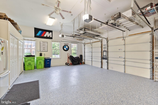 18729 Upper Meadow Dr, Leesburg, VA 20176 - garage with a garage door opener and freestanding refrigerator