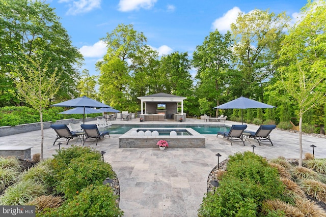 18729 Upper Meadow Dr, Leesburg, VA 20176 - outdoor pool featuring an in-ground hot tub, a patio area, a gazebo, outdoor lounge area, and view of scattered trees