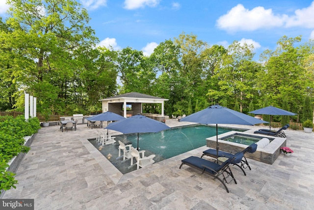 18729 Upper Meadow Dr, Leesburg, VA 20176 - view of pool featuring a patio, fence, a pool with connected hot tub, and outdoor dining area