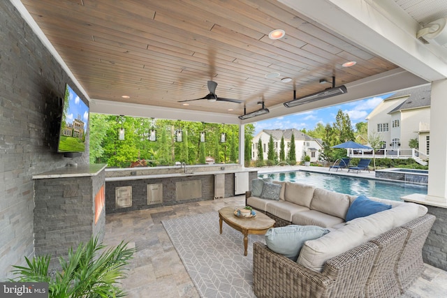18729 Upper Meadow Dr, Leesburg, VA 20176 - view of patio featuring area for grilling, an outdoor living space, a sink, ceiling fan, and a pool with connected hot tub