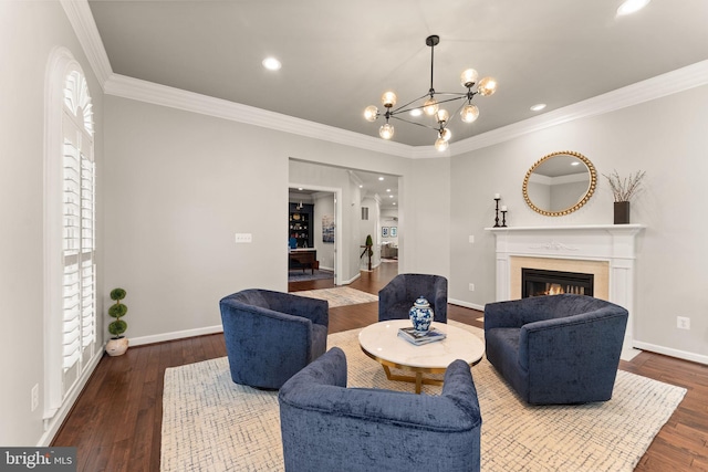 18729 Upper Meadow Dr, Leesburg, VA 20176 - living room featuring crown molding, wood finished floors, baseboards, a lit fireplace, and a chandelier