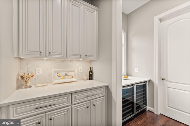 18729 Upper Meadow Dr, Leesburg, VA 20176 - indoor dry bar featuring wine cooler, tasteful backsplash, and dark wood finished floors
