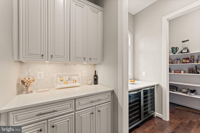18729 Upper Meadow Dr, Leesburg, VA 20176 - indoor bar featuring wine cooler, dark wood-type flooring, and tasteful backsplash