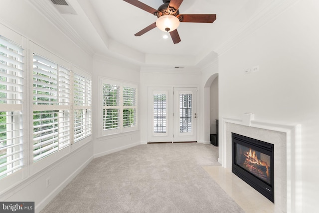 18729 Upper Meadow Dr, Leesburg, VA 20176 - unfurnished living room with arched walkways, a fireplace with flush hearth, carpet floors, ceiling fan, and ornamental molding