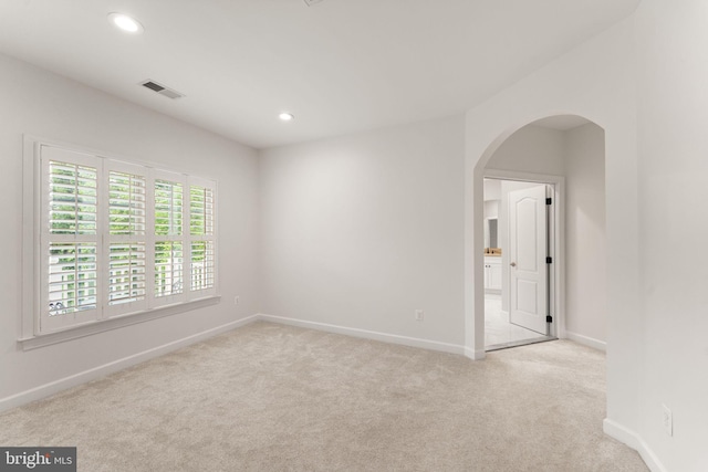 18729 Upper Meadow Dr, Leesburg, VA 20176 - carpeted empty room with baseboards, arched walkways, and recessed lighting