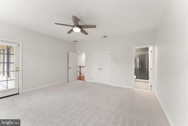 18729 Upper Meadow Dr, Leesburg, VA 20176 - unfurnished bedroom featuring carpet flooring, baseboards, connected bathroom, and ceiling fan