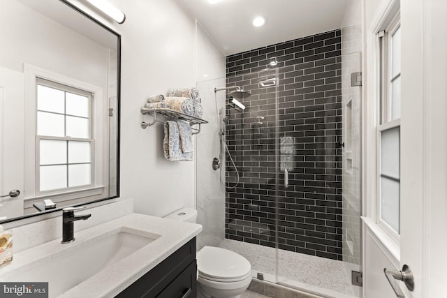 18729 Upper Meadow Dr, Leesburg, VA 20176 - bathroom featuring a stall shower, toilet, vanity, and recessed lighting
