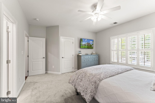 18729 Upper Meadow Dr, Leesburg, VA 20176 - bedroom featuring light colored carpet, baseboards, and a ceiling fan