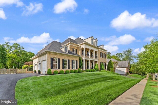 18729 Upper Meadow Dr, Leesburg, VA 20176 - view of front of property featuring brick siding, driveway, and an attached garage