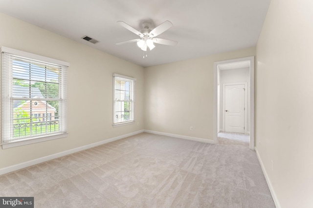 18729 Upper Meadow Dr, Leesburg, VA 20176 - unfurnished room with healthy amount of natural light, a ceiling fan, and light carpet