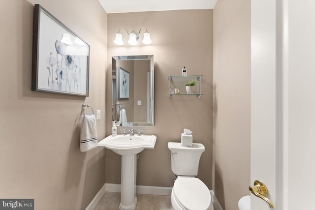 18729 Upper Meadow Dr, Leesburg, VA 20176 - half bathroom featuring toilet, tile patterned floors, and baseboards
