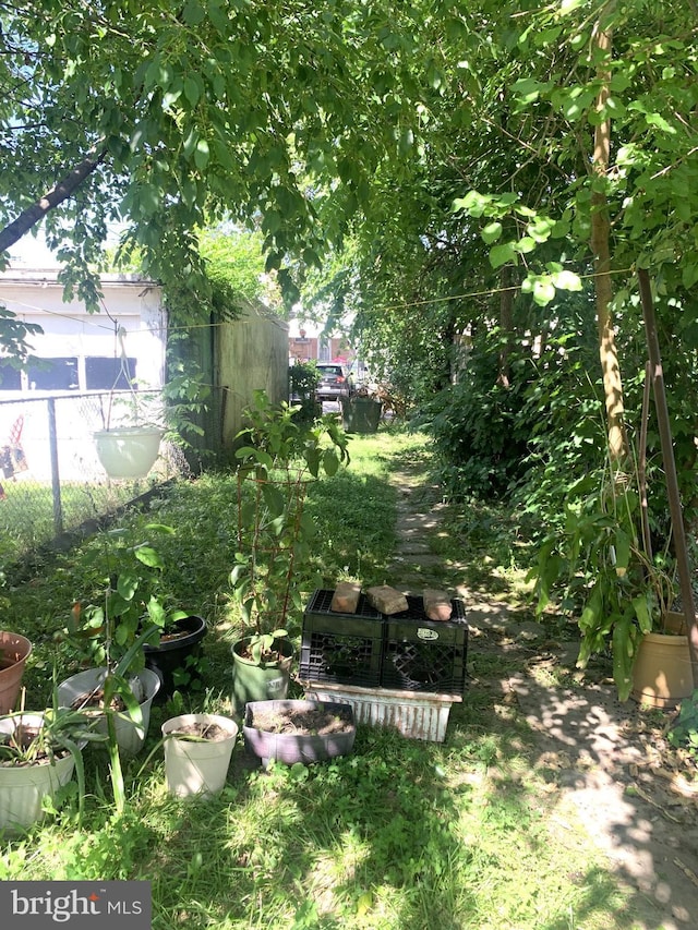 917 Pennell St, Chester, PA 19013 - view of yard featuring fence and a vegetable garden