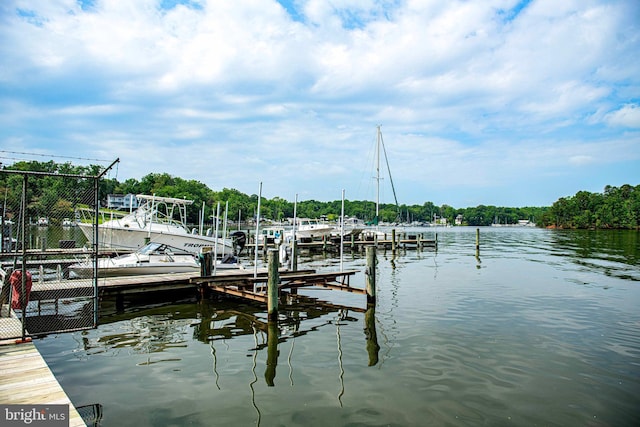 dock featuring a water view and boat lift
