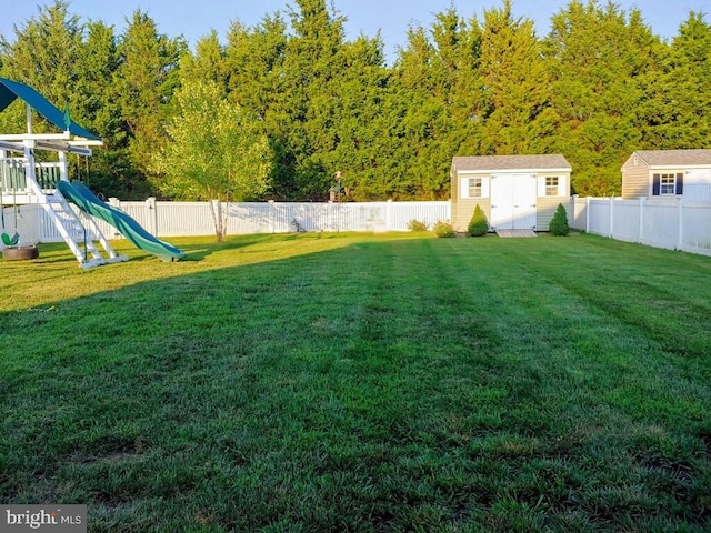 541 Conor Dr, Stevensville, MD 21666 - view of yard featuring a playground, a shed, and an outdoor structure