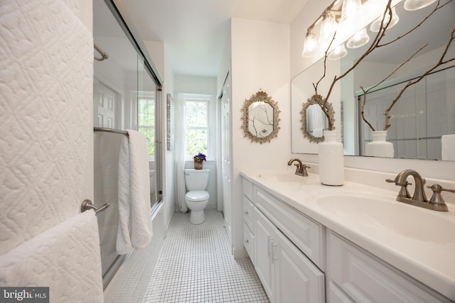 154 Plowshare Rd, Eagleville, PA 19403 - bathroom with toilet, double vanity, bath / shower combo with glass door, and tile patterned flooring