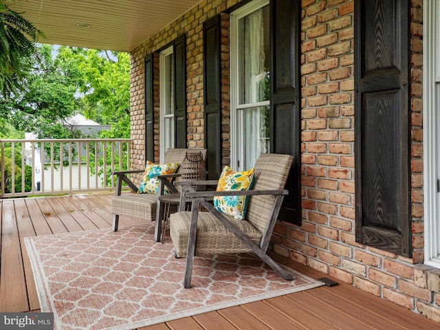 6085 Franklin Gibson Rd, Tracys Landing, MD 20779 - view of wooden porch