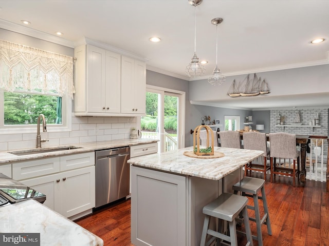 6085 Franklin Gibson Rd, Tracys Landing, MD 20779 - kitchen featuring dishwasher, a sink, tasteful backsplash, dark wood-type flooring, and white cabinets