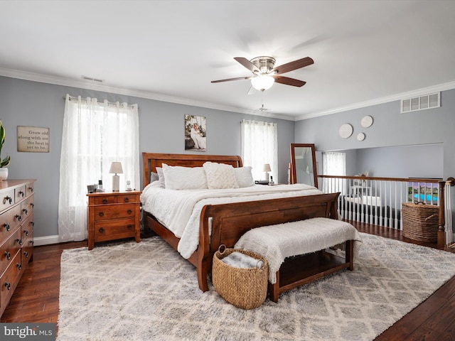 6085 Franklin Gibson Rd, Tracys Landing, MD 20779 - bedroom featuring ornamental molding, wood-type flooring, ceiling fan, and baseboards