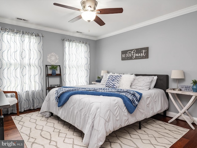 6085 Franklin Gibson Rd, Tracys Landing, MD 20779 - bedroom featuring crown molding, wood finished floors, and a ceiling fan