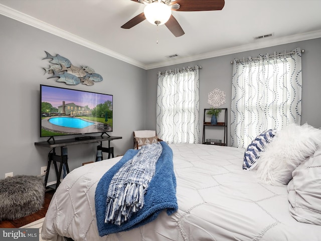 6085 Franklin Gibson Rd, Tracys Landing, MD 20779 - bedroom with crown molding, wood finished floors, and ceiling fan