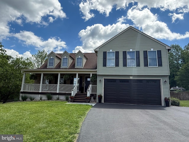 6085 Franklin Gibson Rd, Tracys Landing, MD 20779 - view of front of home with a garage, asphalt driveway, a porch, and a front lawn