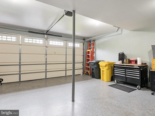 6085 Franklin Gibson Rd, Tracys Landing, MD 20779 - garage featuring a garage door opener