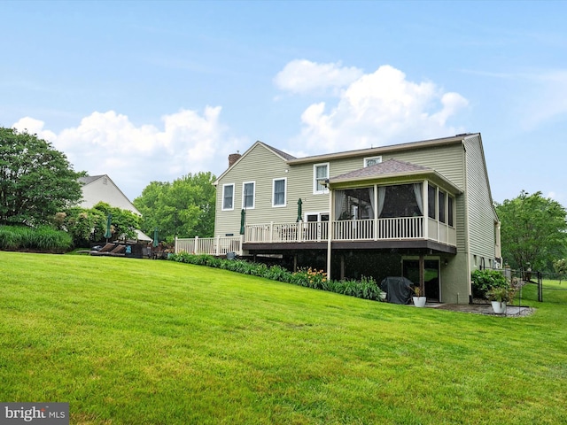 6085 Franklin Gibson Rd, Tracys Landing, MD 20779 - rear view of house with a sunroom, a lawn, and a chimney