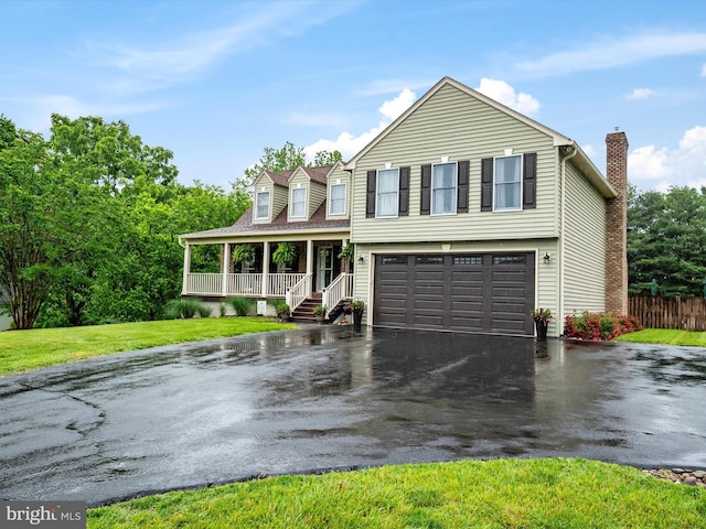 6085 Franklin Gibson Rd, Tracys Landing, MD 20779 - view of front facade featuring driveway, covered porch, a garage, and a chimney