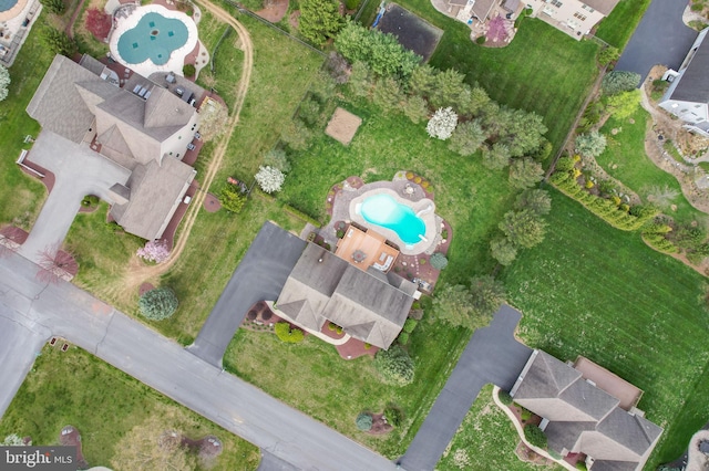 view of property location with a pool