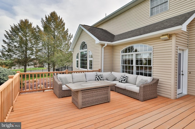 deck featuring outdoor lounge area