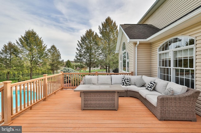 deck with an outdoor hangout area