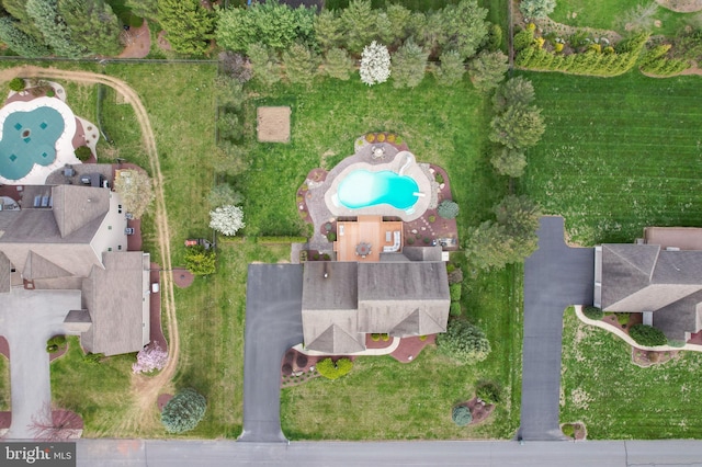 view of property location featuring a pool area