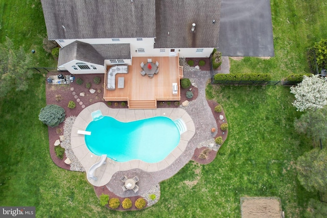 drone / aerial view of a pool