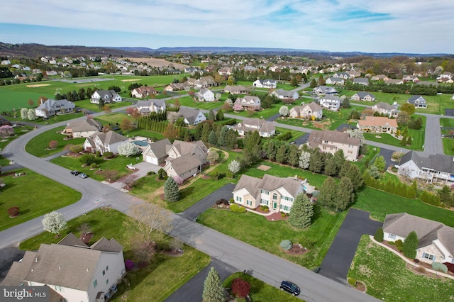 aerial overview of property's location with nearby suburban area