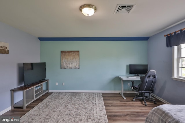 office area featuring wood finished floors and baseboards