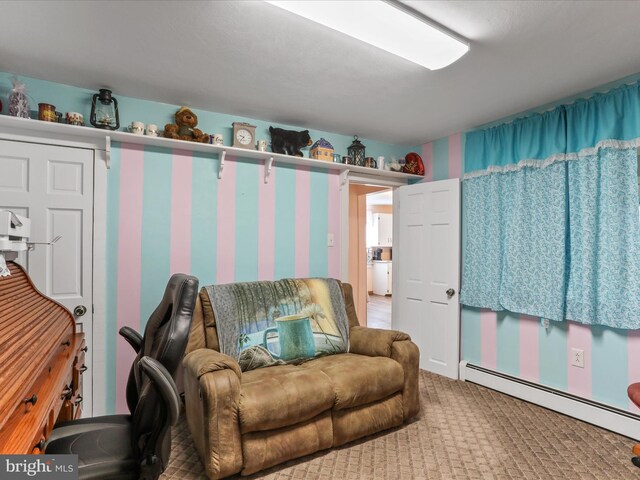 4126 Coseytown Rd, Greencastle, PA 17225 - carpeted living area featuring a baseboard heating unit