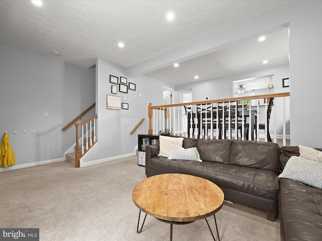 6300 Loring Dr, Columbia, MD 21045 - carpeted living area with recessed lighting, baseboards, stairway, ceiling fan, and a textured ceiling