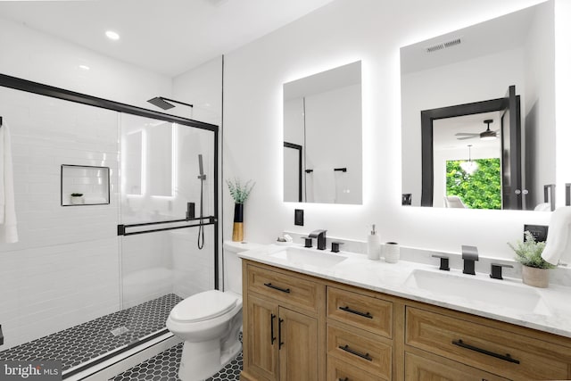 1404 Montello Ave NE, Washington, DC 20002 - bathroom with a shower stall, double vanity, toilet, and ceiling fan