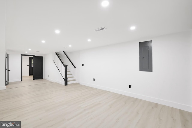 1404 Montello Ave NE, Washington, DC 20002 - finished below grade area with electric panel, stairs, light wood-style floors, recessed lighting, and baseboards