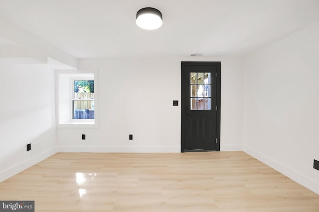 1404 Montello Ave NE, Washington, DC 20002 - entrance foyer with wood finished floors, plenty of natural light, and baseboards