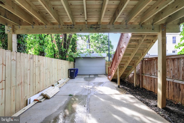 1404 Montello Ave NE, Washington, DC 20002 - view of patio featuring stairway and a fenced backyard