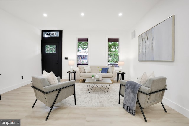 1404 Montello Ave NE, Washington, DC 20002 - living area featuring recessed lighting, light wood-style floors, and baseboards